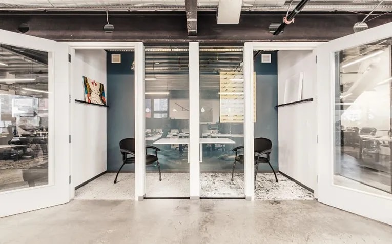 Individual enclosed workstations at the Graham Baba Architects-designed office of Glympse in Seattle. (Rafael Soldi)