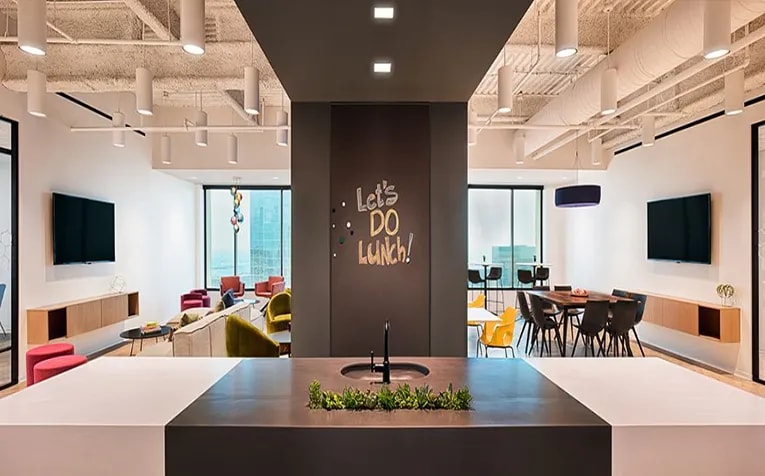 The Nova Chemicals office in Houston, designed by Abel Design Group, offers a versatile lounge space for work, collaboration and socializing. (Brad Carr)