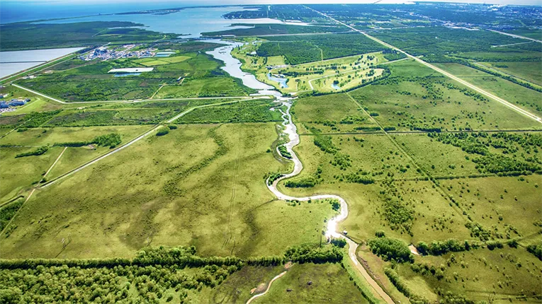 Ariel view of land covered in green grass