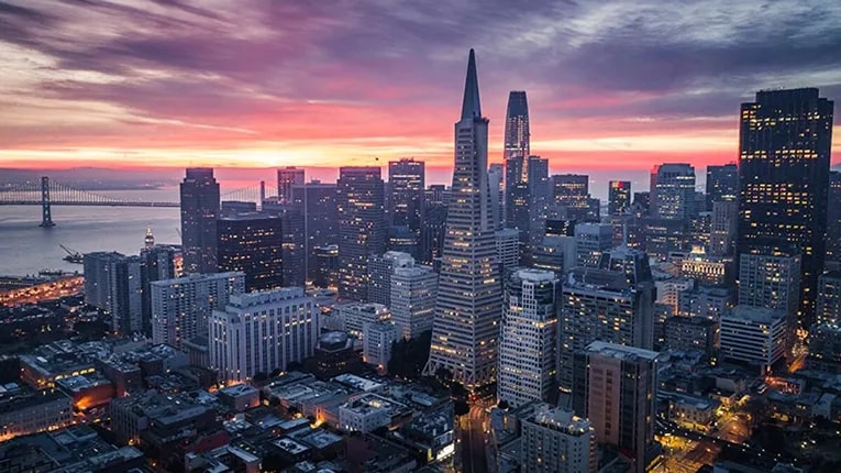 Ariel view of a cityscape during sunset