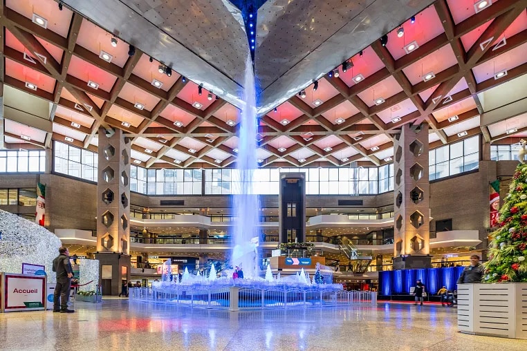 View from inside of Montreal's underground pedestrian walkway called RESO, La Ville Souterraine featuring shops, malls, offices, hotels, museums and entertainment venues.