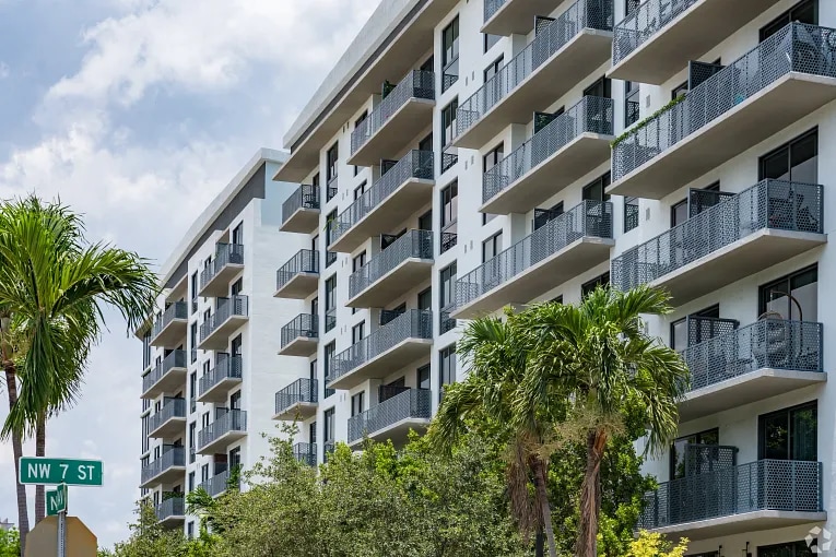 View of an apartment building with balconies in the Riverside neighborhood of Miami, FL.