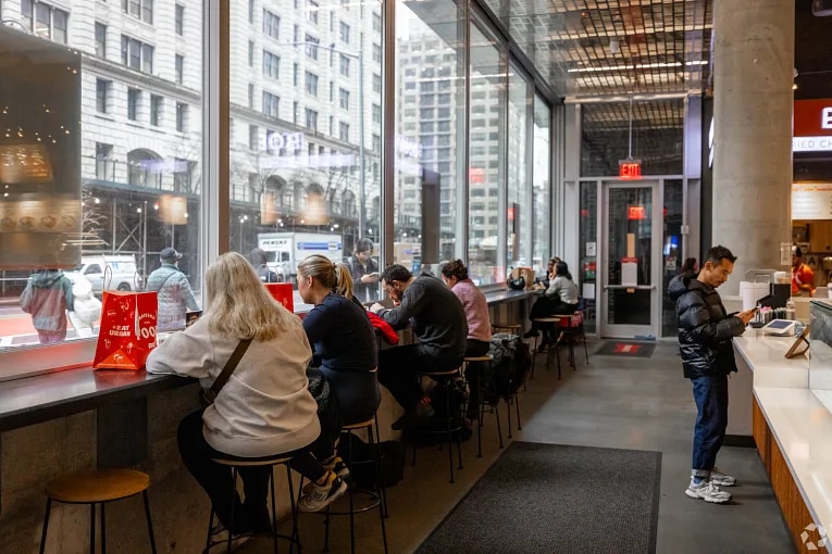 View of diners at a foodhall in the Gramercy Park neighborhood in New York, NY.