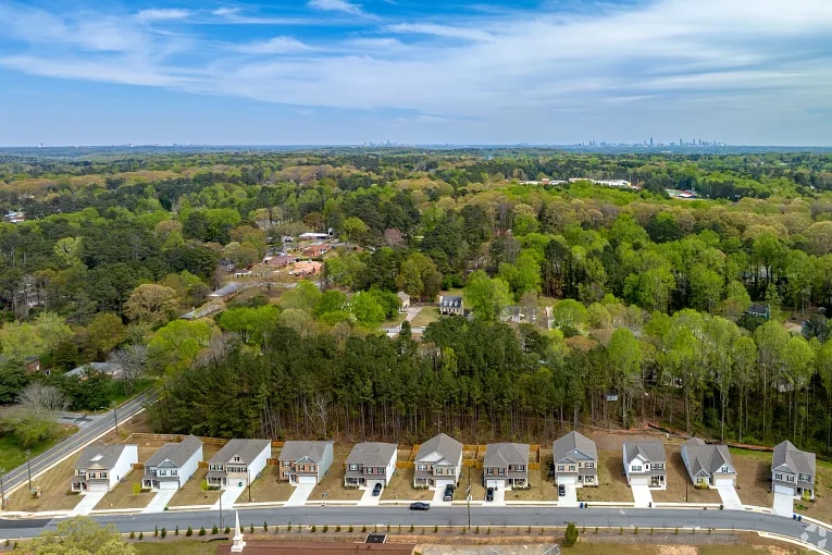 Aerial view of a neighborhood street and housesin Mableton, GA.