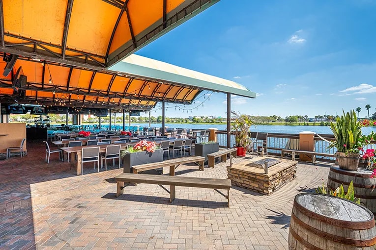 Outdoor seating at a waterfront restaurant