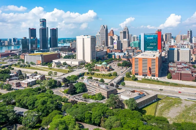 Detroit land and skyline showing tall commercial real estate buildings