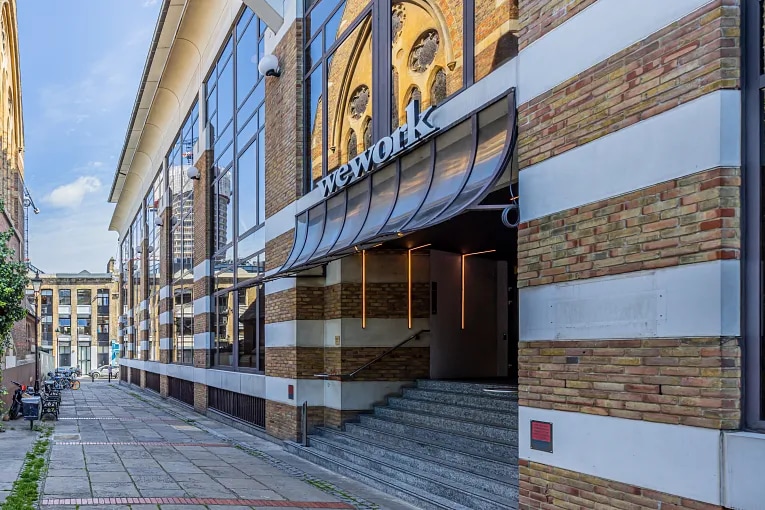 Street level view of entrance to WeWork in London, England.